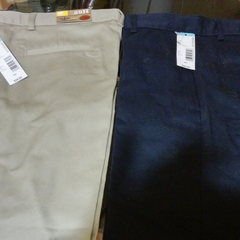 2 pair of shorts - 1 khaki color   1 dark blue